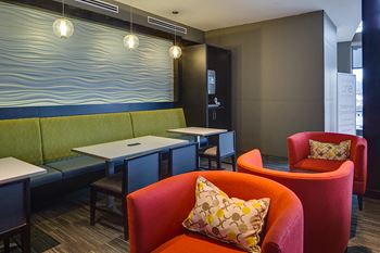 Cyber lounge with power up tables, wireless work stations, wi-fi, fireplace and hot beverage station